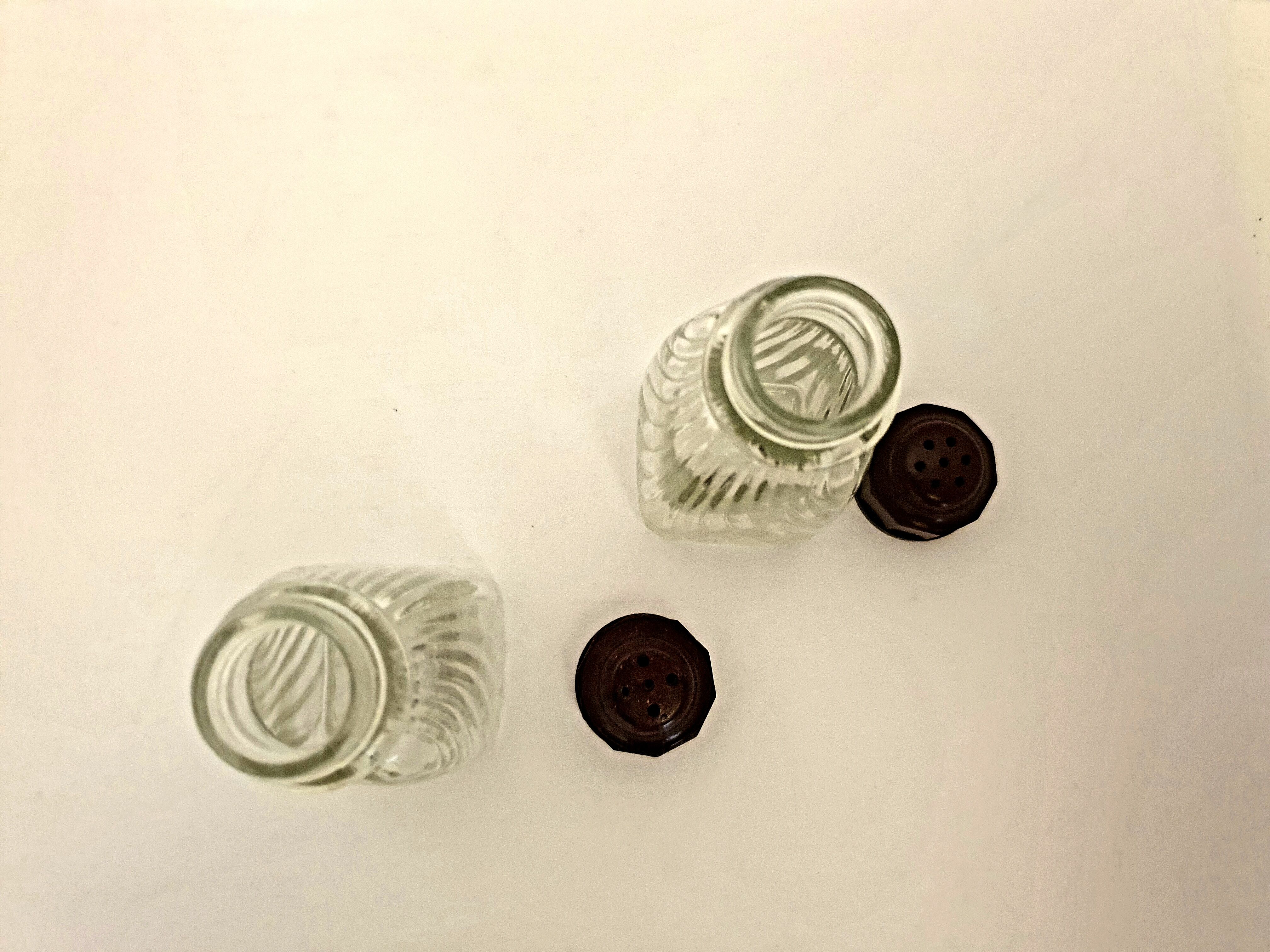 Glass and bakelite art deco salières