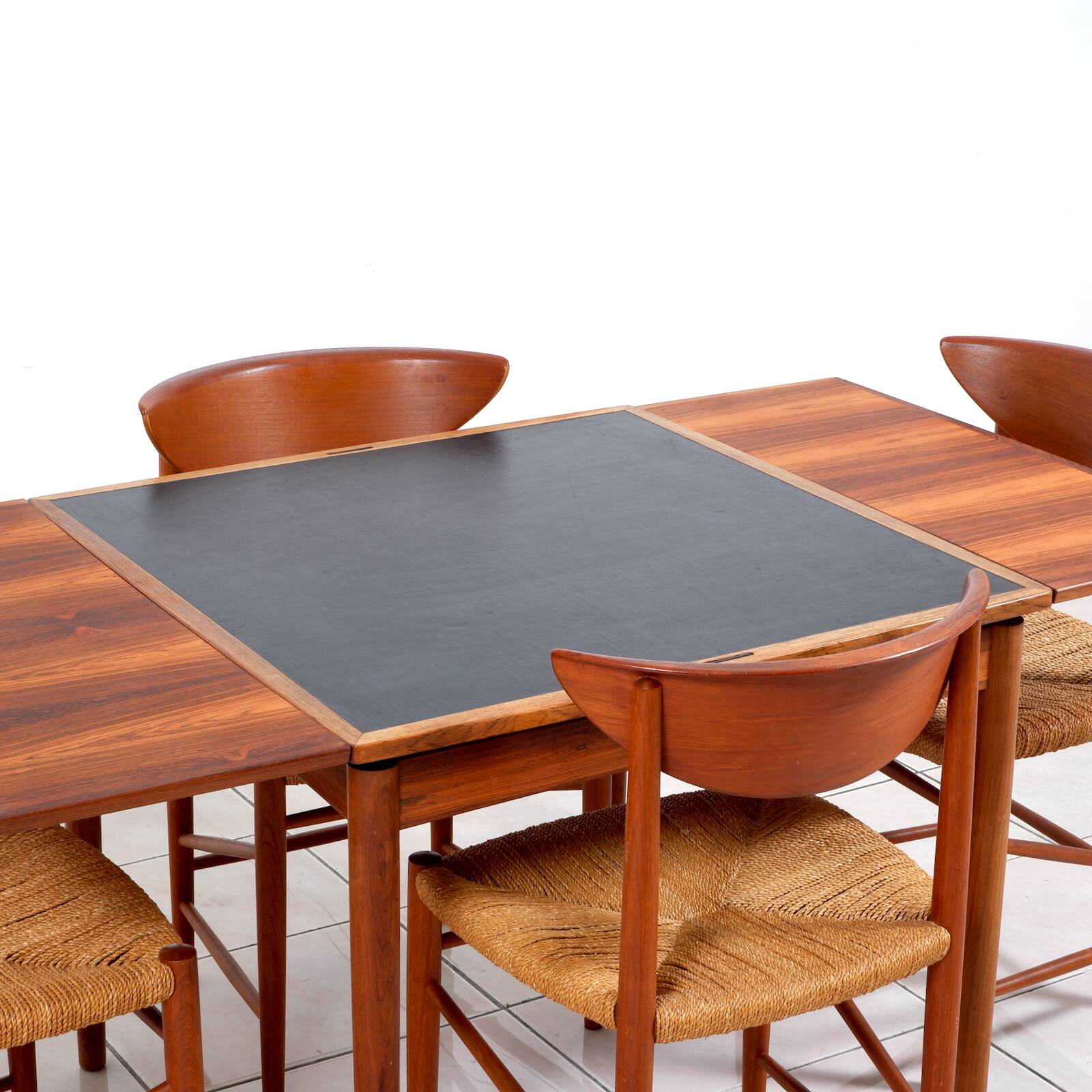 Rosewood / leather dining / gaming table by Poul Hundevad