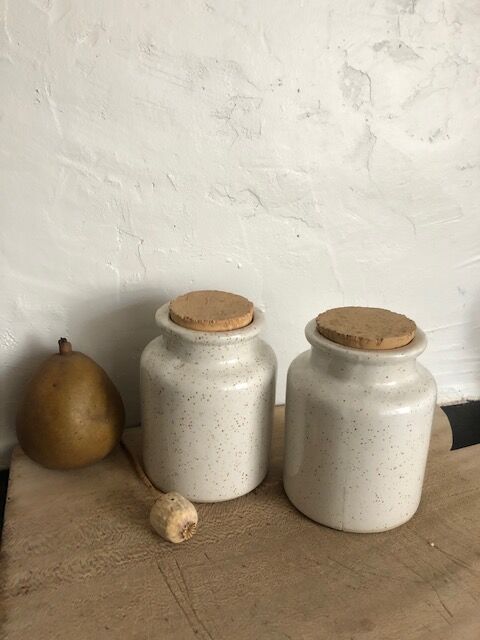 Duo of pots with white sandstone lids
