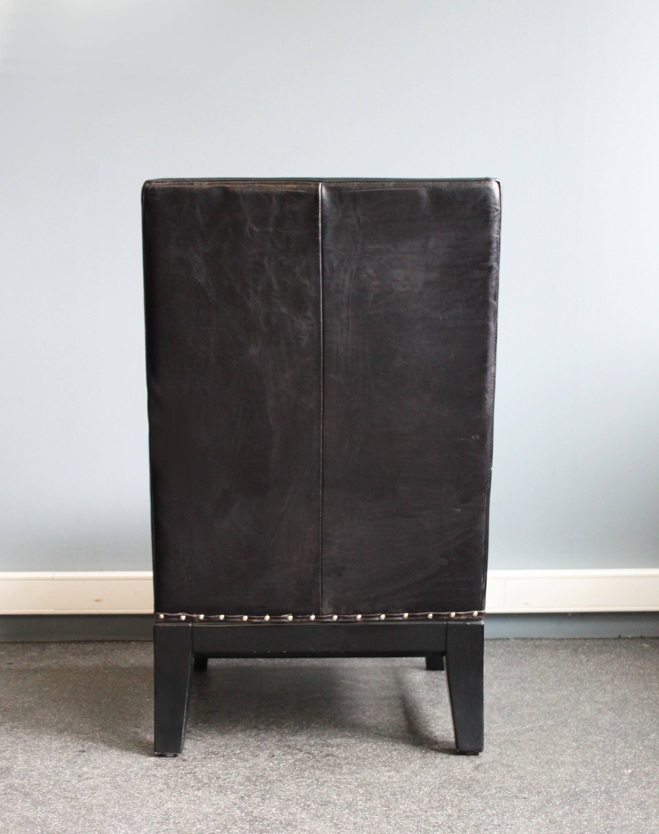 Modern black leather armchair, 20th century.