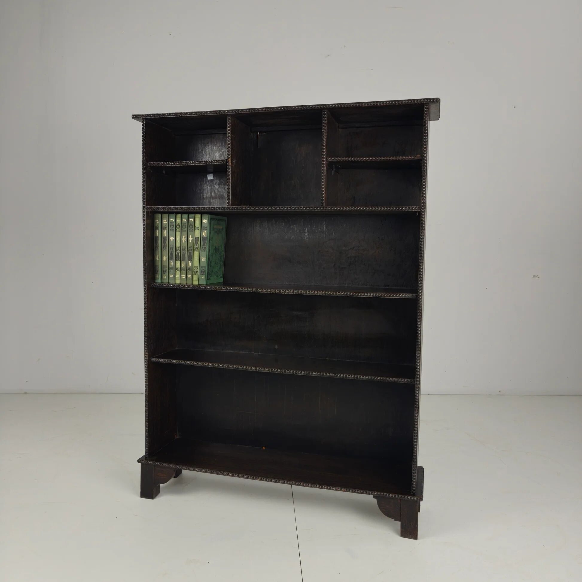 20th century open bookcase with bead motif