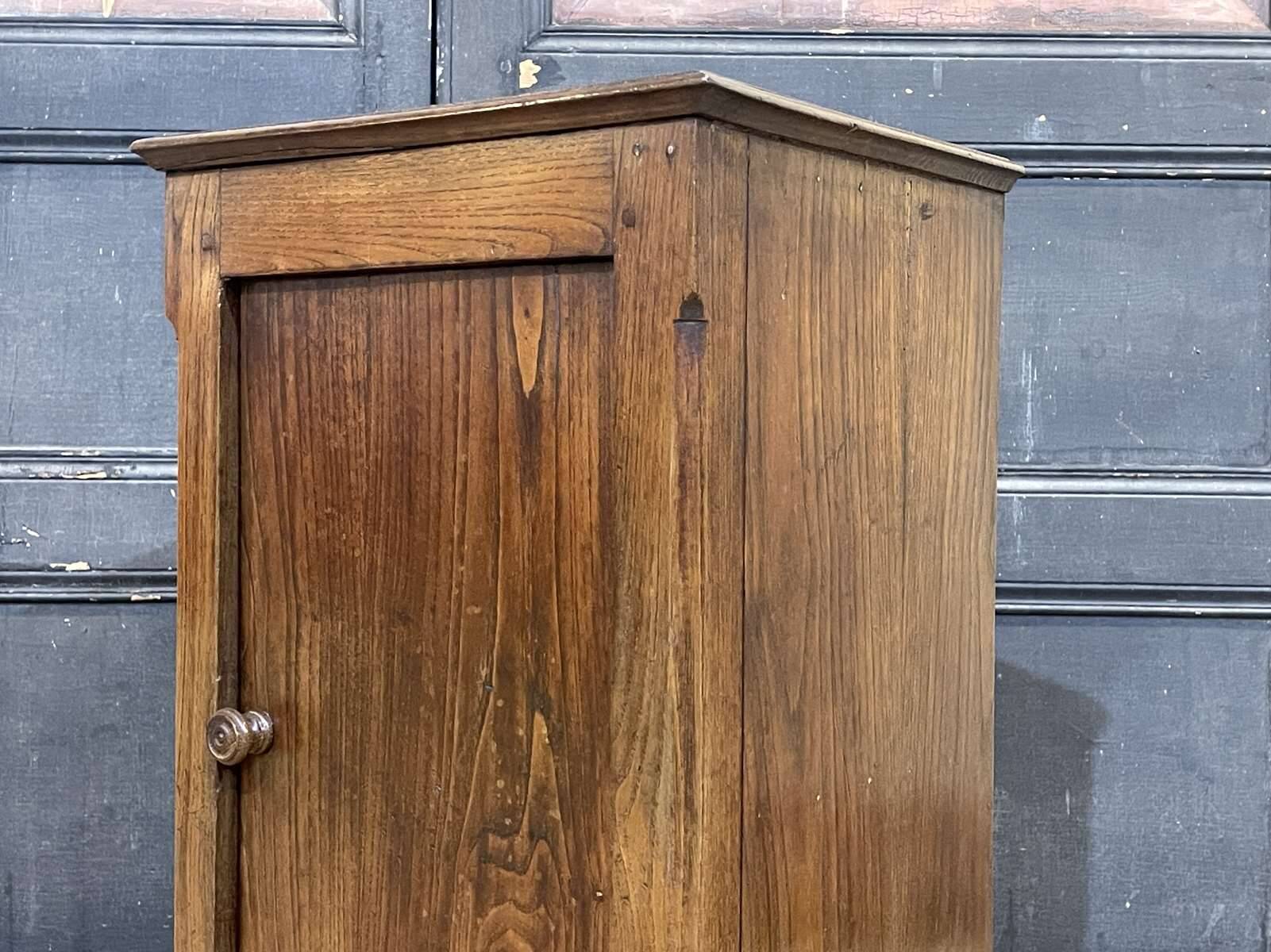 Chestnut bedside table from the early 20th century.