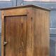 Chestnut bedside table from the early 20th century.