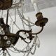 Louis XVI style chandelier with a pearl garland and painted tin, 20th century.