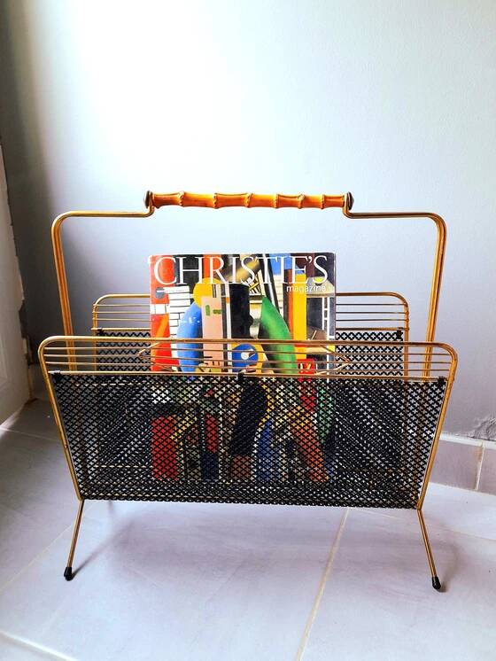 Perforated metal magazine rack, 1950