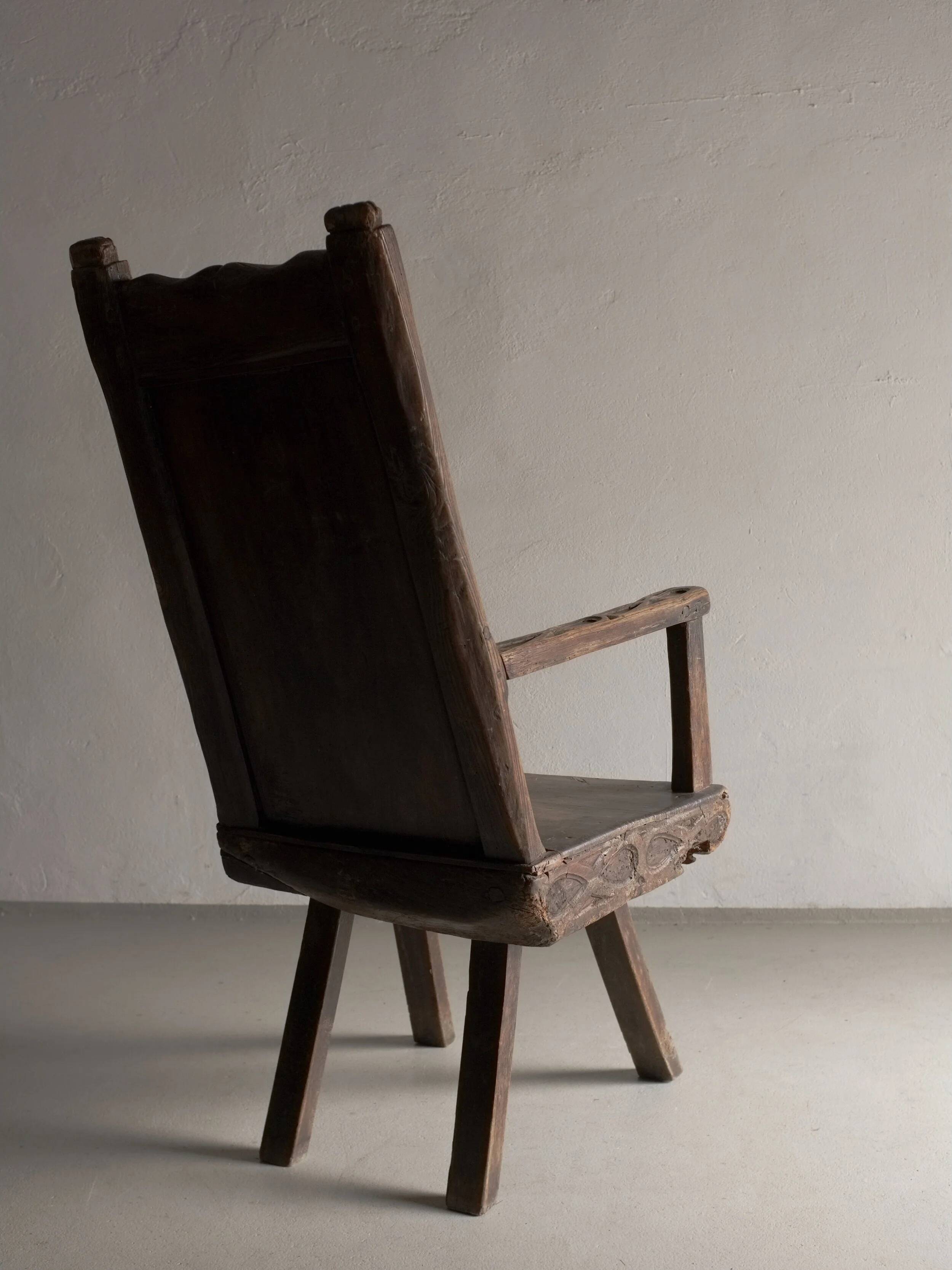 Antique primitive carved oak arm chair, Belgium