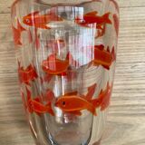 Glass vase with fish inclusions
