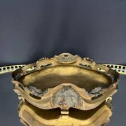 Art Nouveau jardinière in gilded bronze with holly decoration, signed E. Gros.