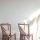 Pair of vintage rattan armchairs circa the 1960s.