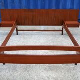 Teak bed with hanging bedside tables from the 60s