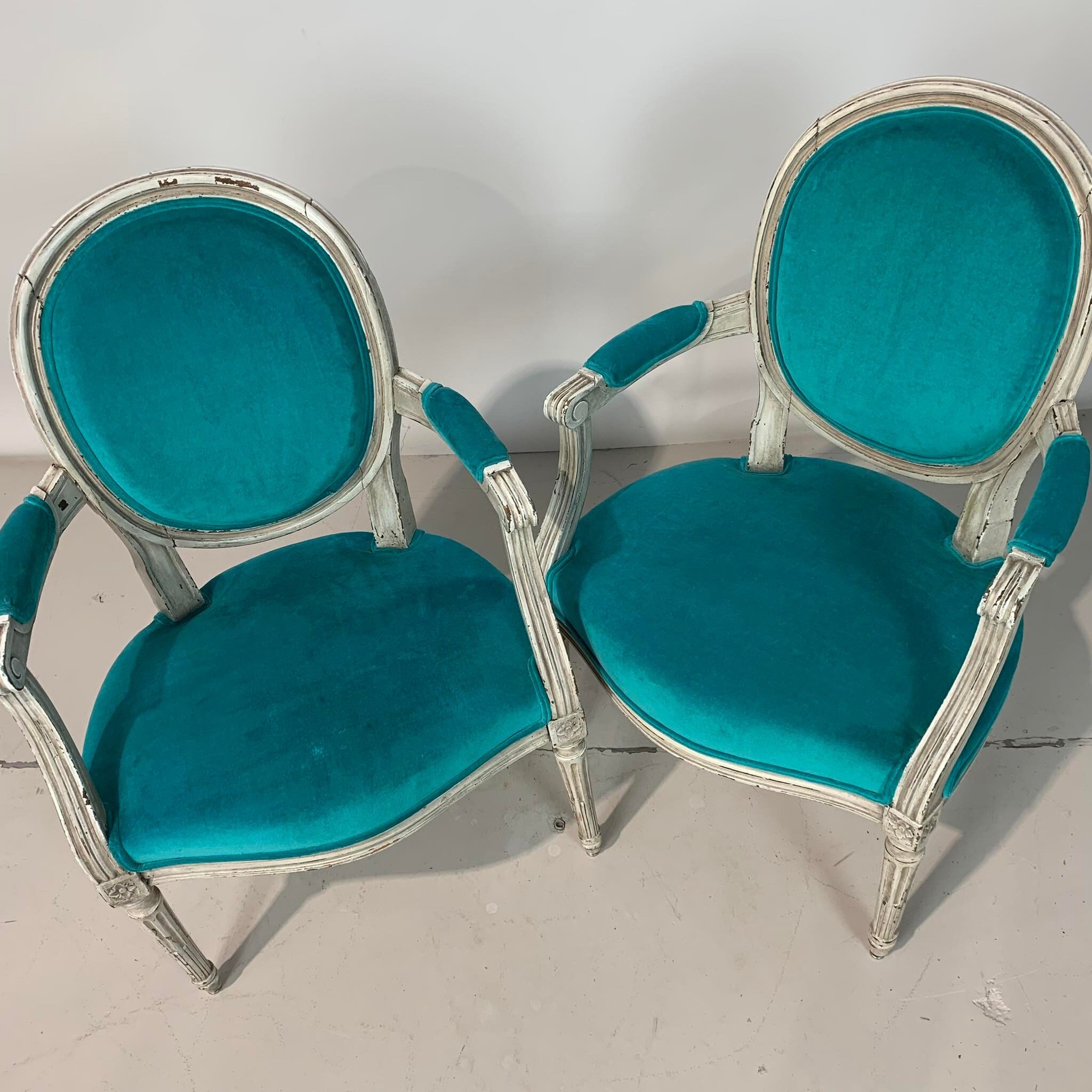 Pair of Louis XVI convertible armchairs