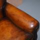 Two-seater canapé in aged leather, Victorian style.