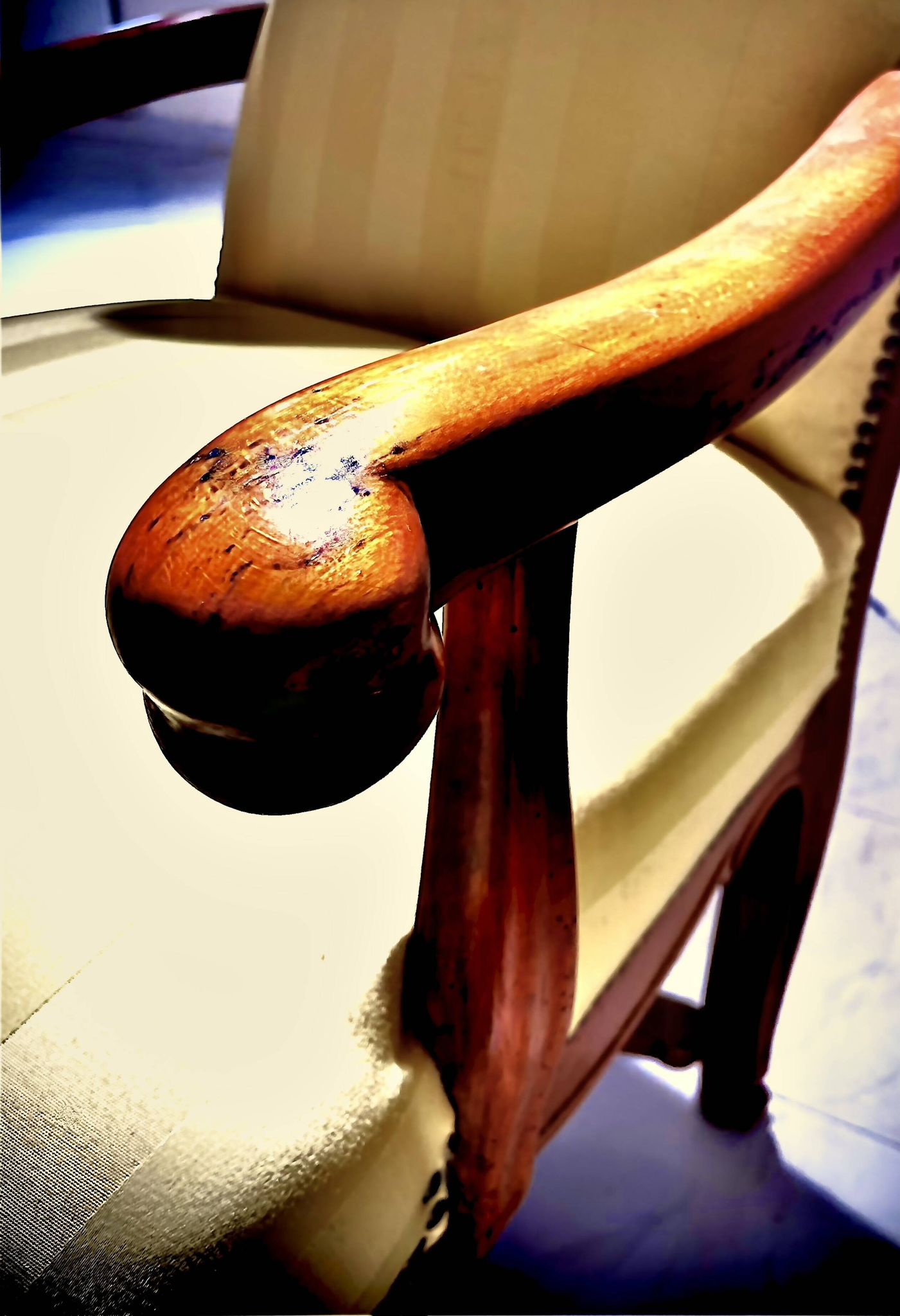 Wingback armchair in walnut in the French Regency style with stretcher in