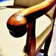 Wingback armchair in walnut in the French Regency style with stretcher in