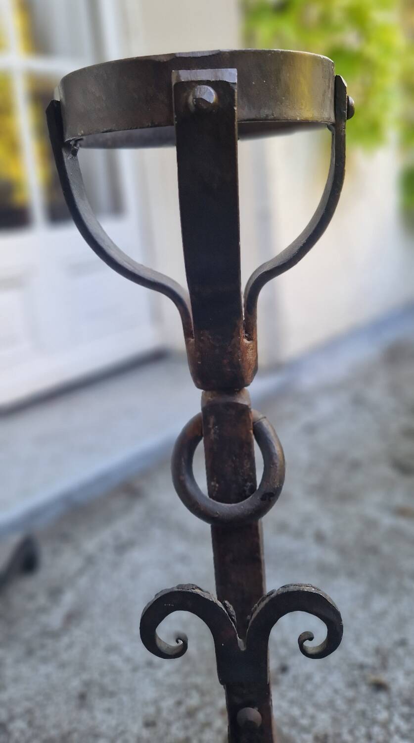 Pair of wrought iron andirons by Landier from the 17th century.