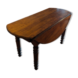 Round table with hinged doors