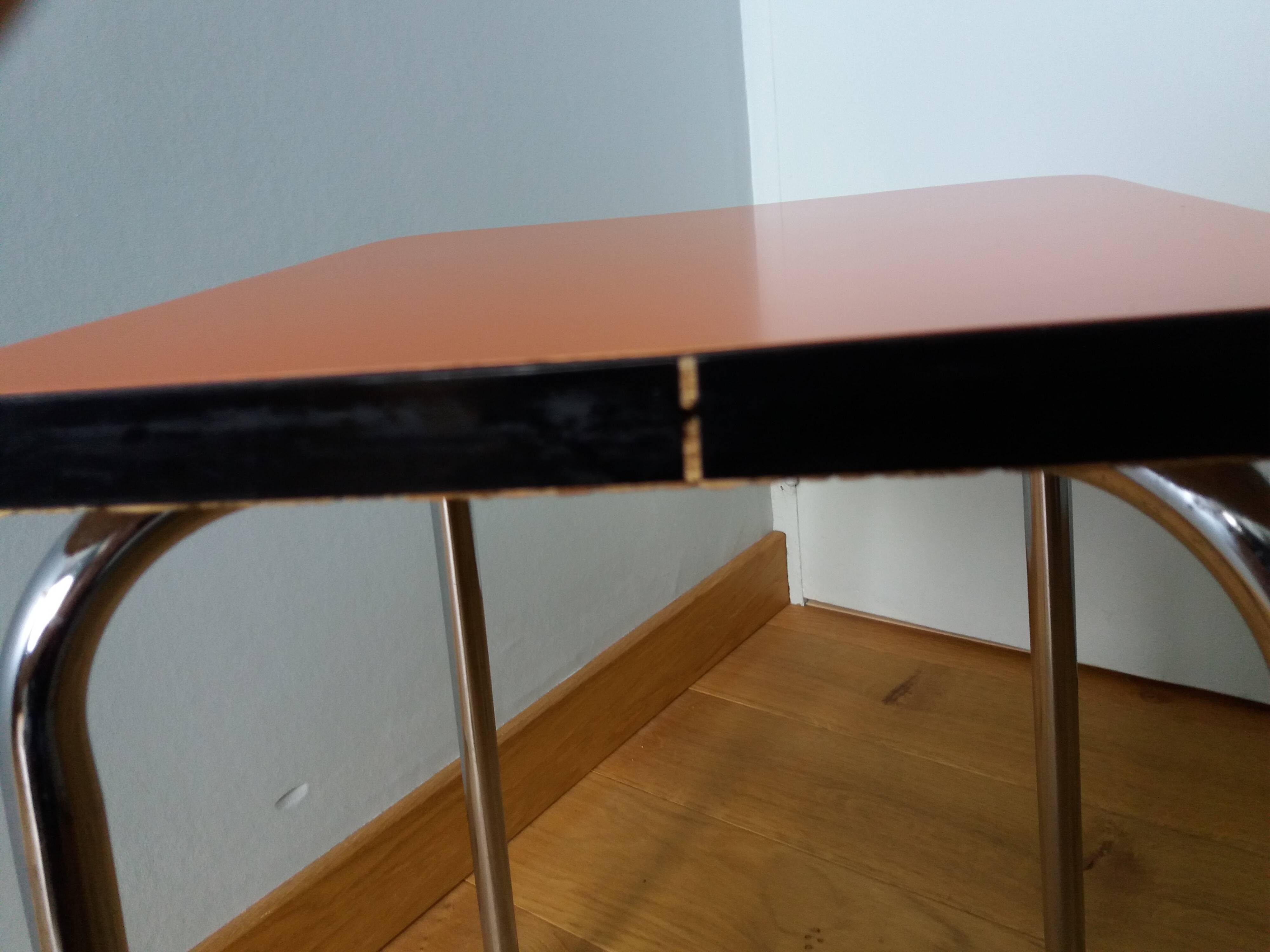 Chrome metal and orange formica stool