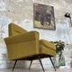 Vintage armchair in fabric and metal compass legs, circa 1950.
