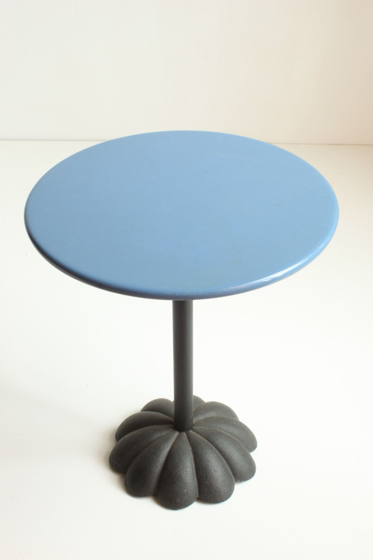 Postmodern cast iron flower base adjustable round side tables, blue and green, 1980s.