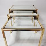Three trundle tables gilded brass and silver 60s