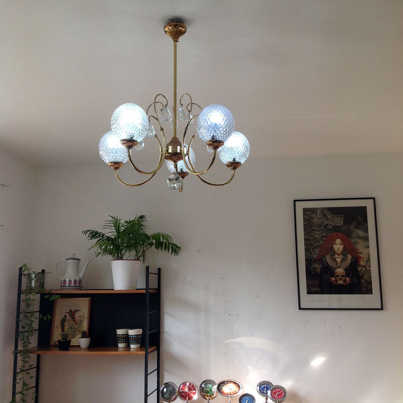 Glass and gold with stamps hanging lamp