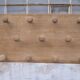 Wall coat rack in oak.