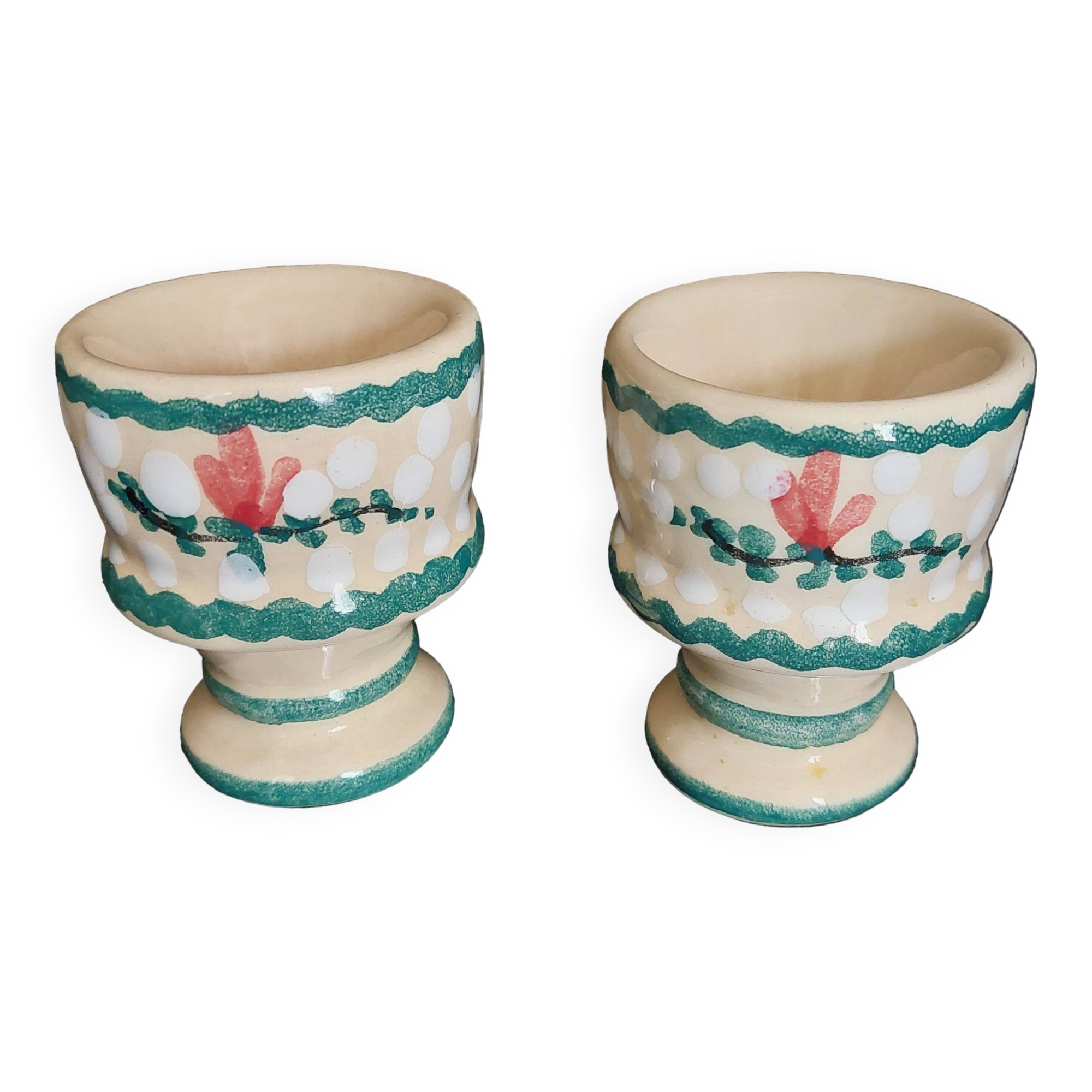 Pair of vintage earthenware egg cups with hand-painted decoration
