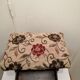 Antique footrest stool in wood and fabric