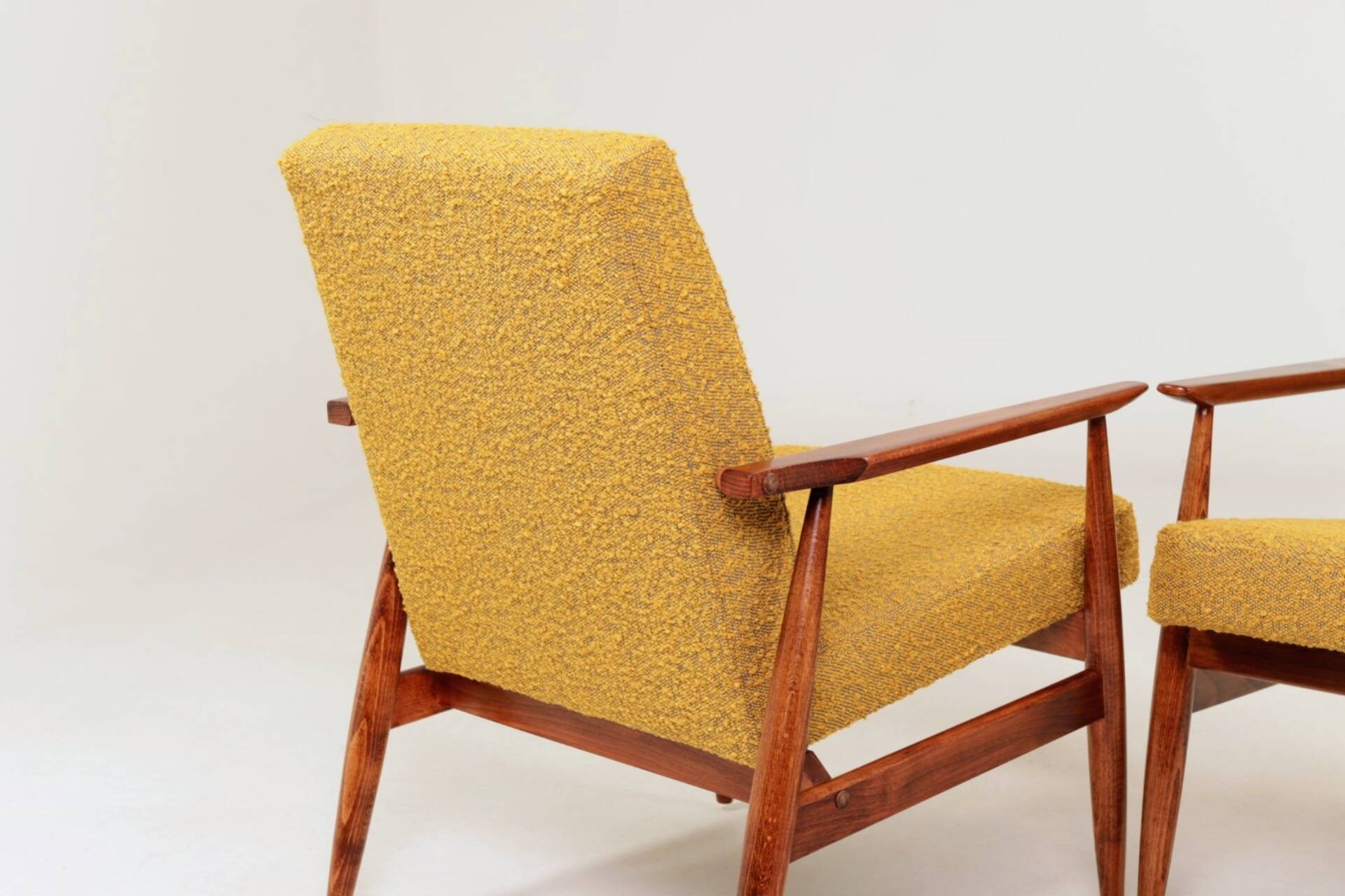 Pair of vintage boucle mustard armchairs H.Lis