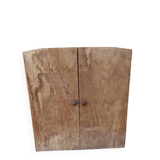 Small freestanding or wall-mounted wooden cabinet.
