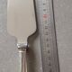 Set of 12 dessert forks and a cake server.
