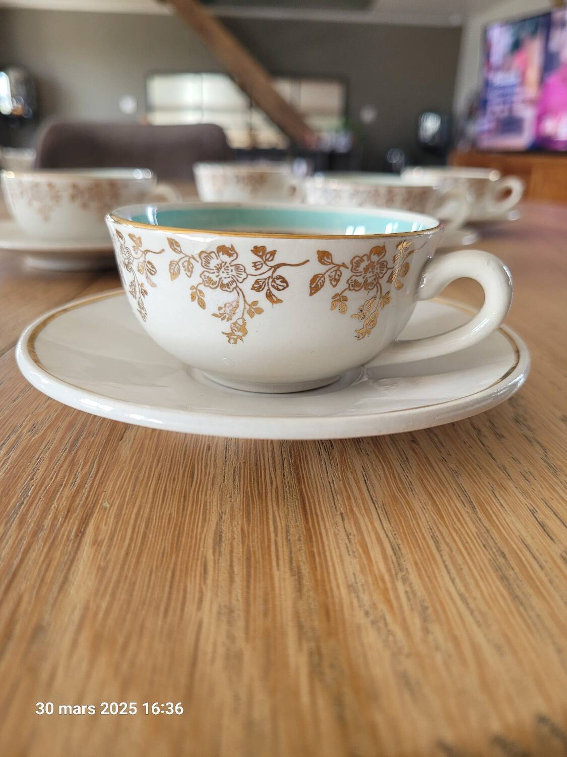 5 antique cups and saucers