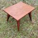 Coffee table of the 50s in blond mahogany inlaid compass feet