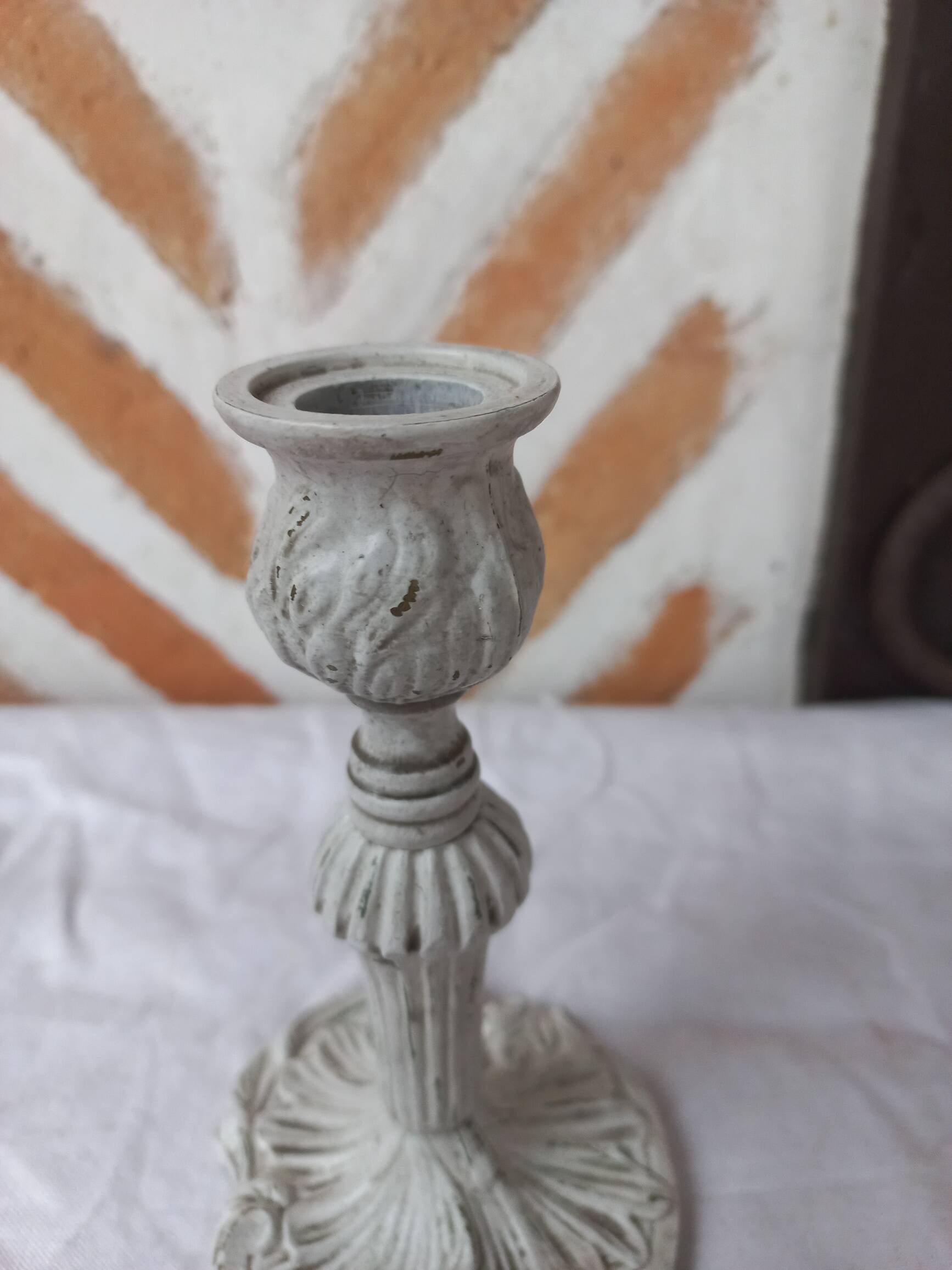 Candlestick holder patinated white gray