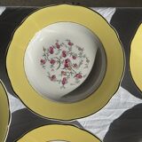 Set of 9 large vintage yellow deep plates with pink flowers and a gold rim.