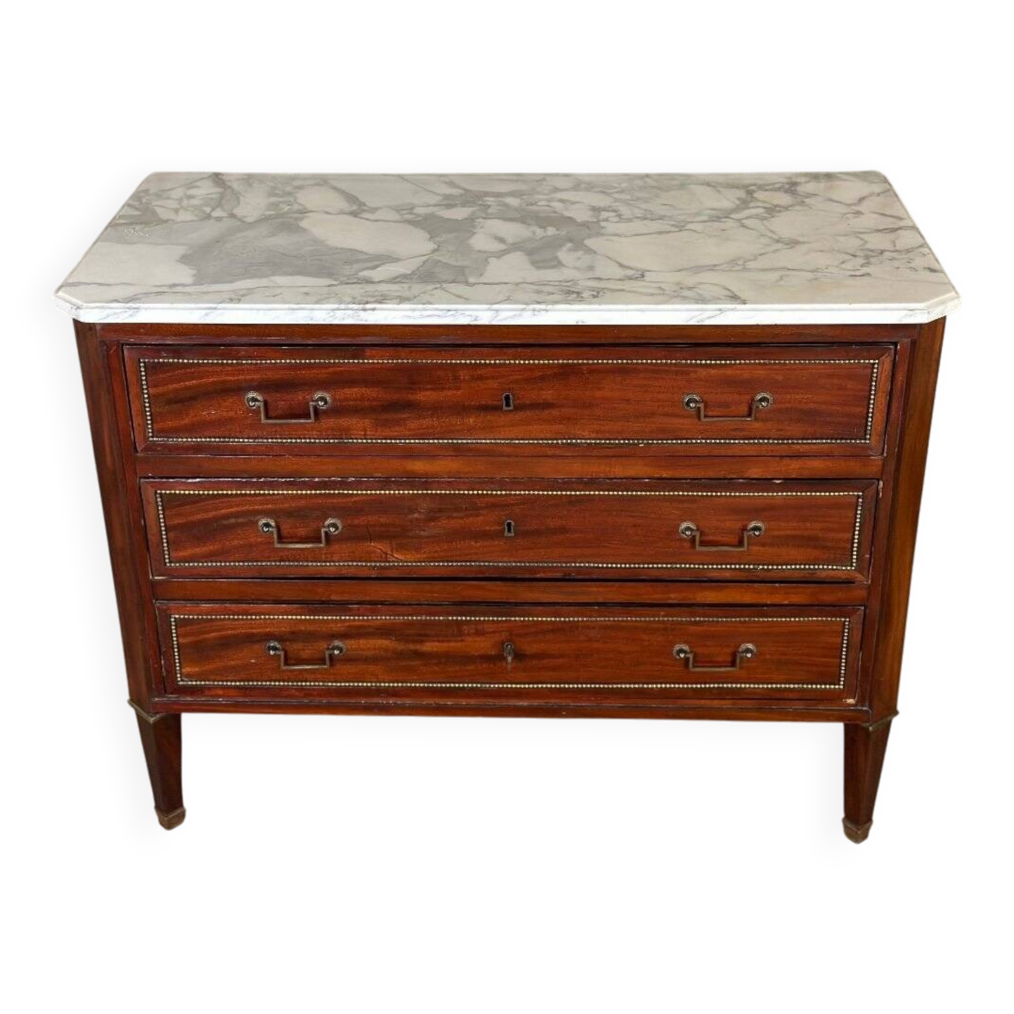 Louis XVI commode in mahogany with brass beading, arabescato marble top, 18th century