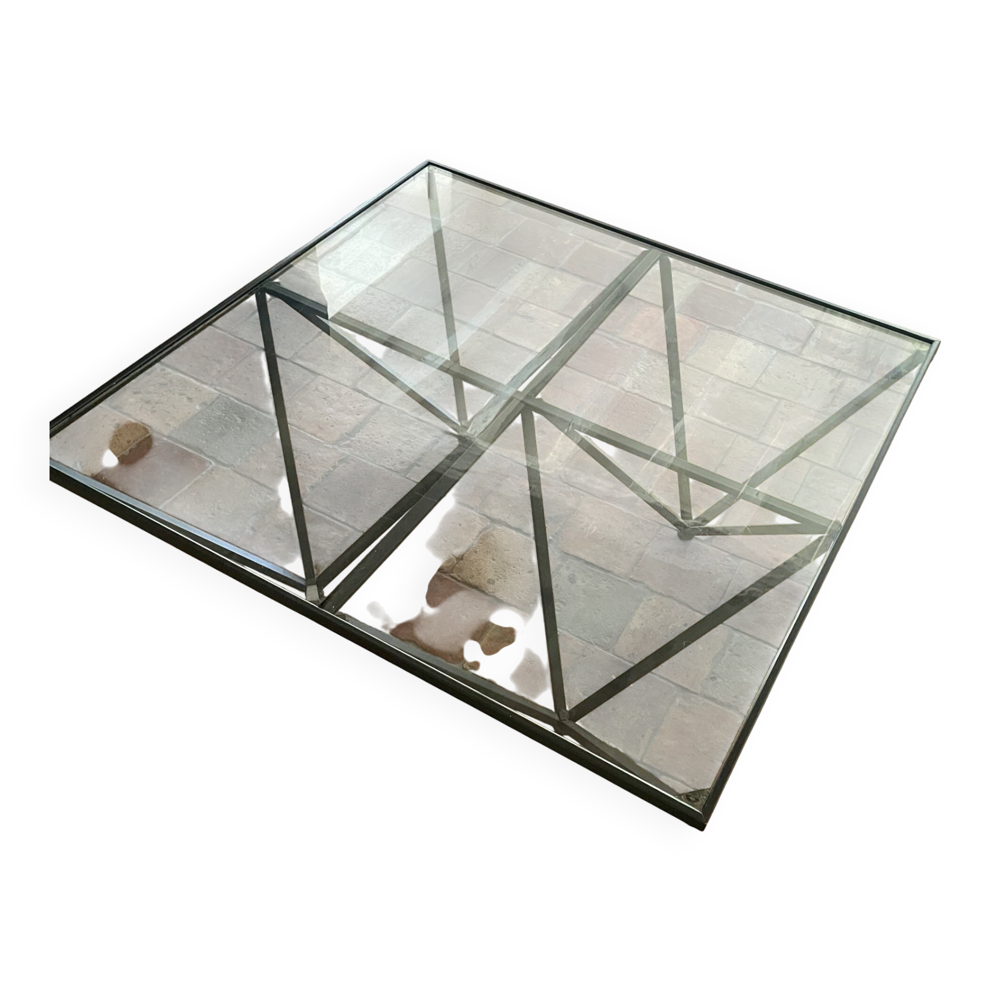 Design coffee table in glass and black metal – Geometric base