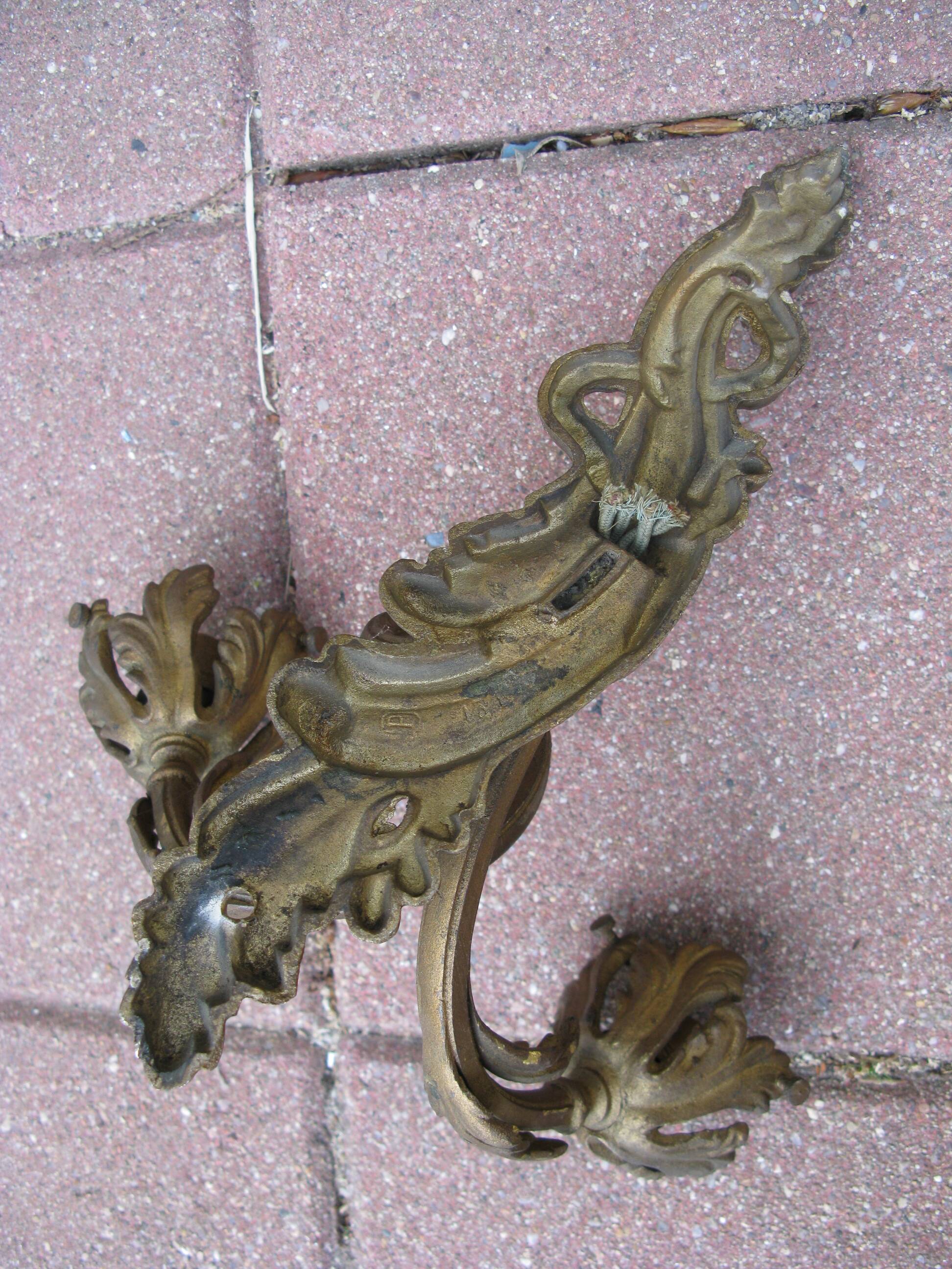 bronze wall light in the rococo style from the late 19th century