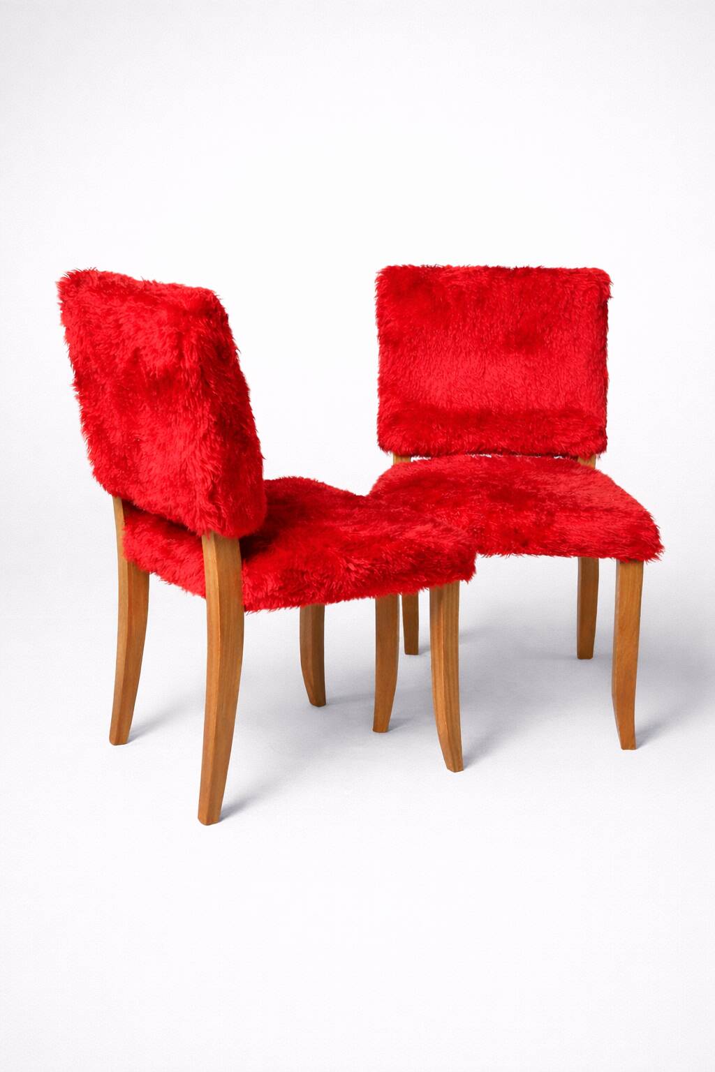 Pair of vintage wooden chairs with red fur effect upholstery – 1950