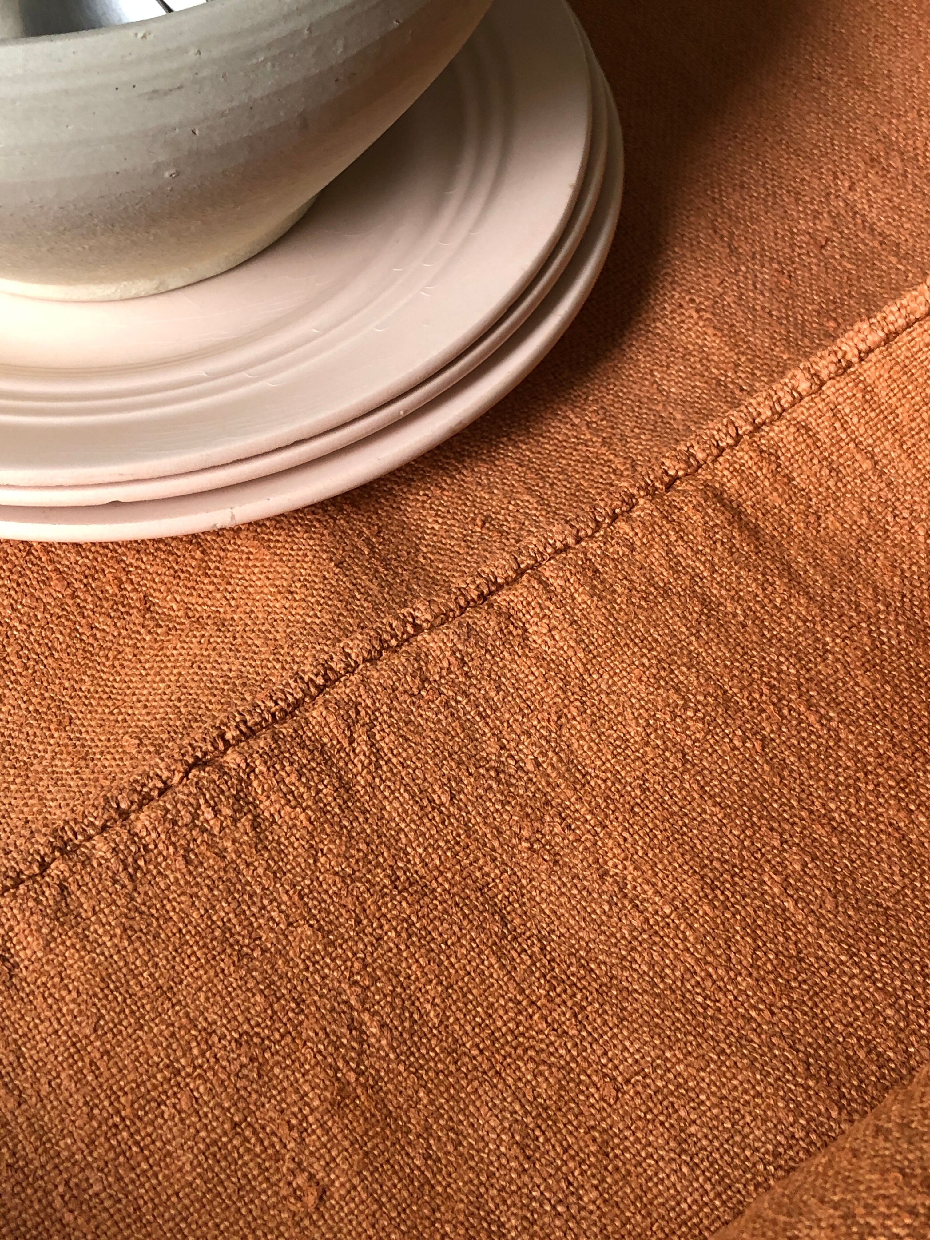 Old harvest tablecloth in terracotta tinted hemp