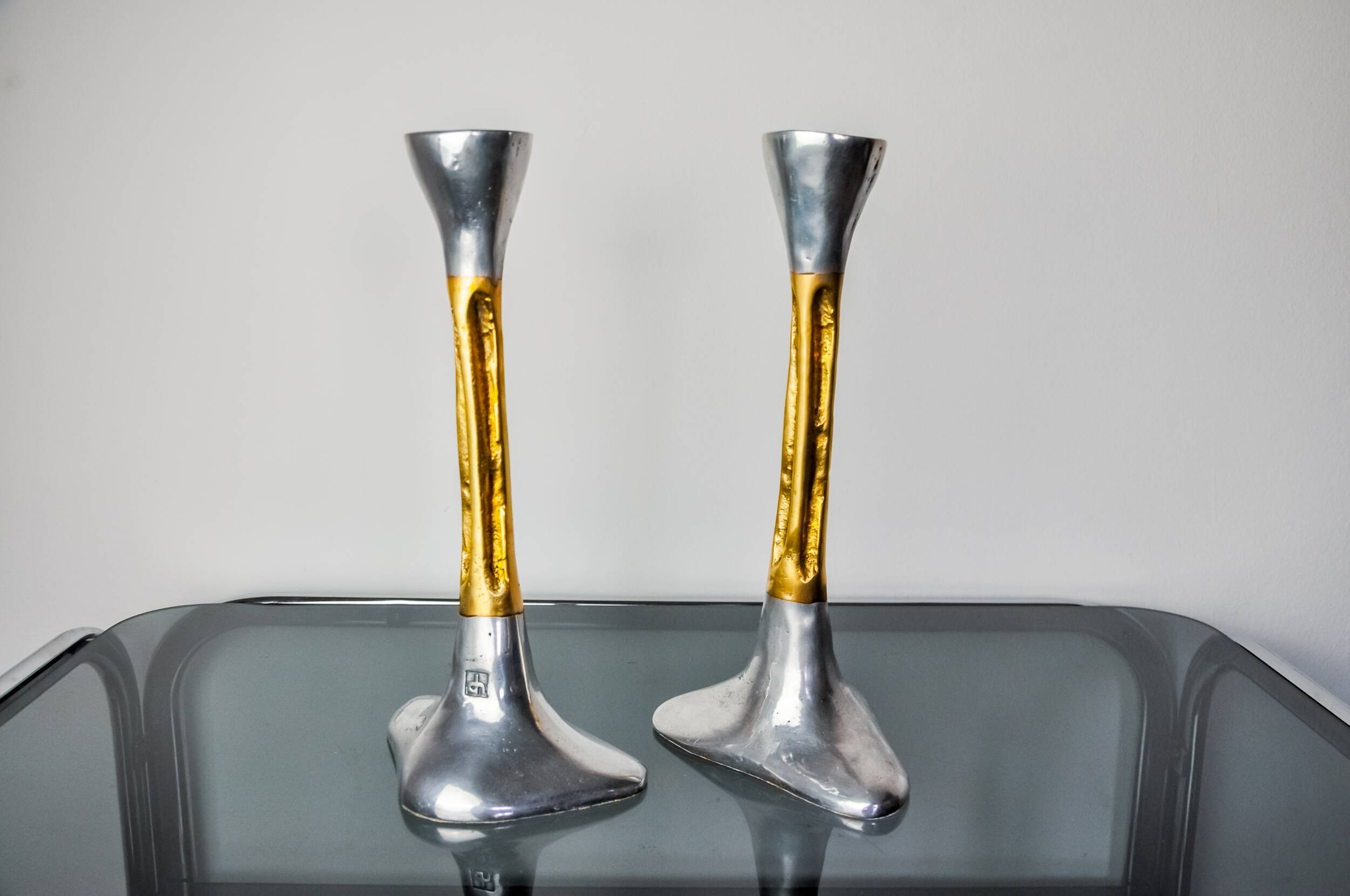 Pair of Brutalist candlesticks by David Marshall, bronze and aluminum, Spain, 1970