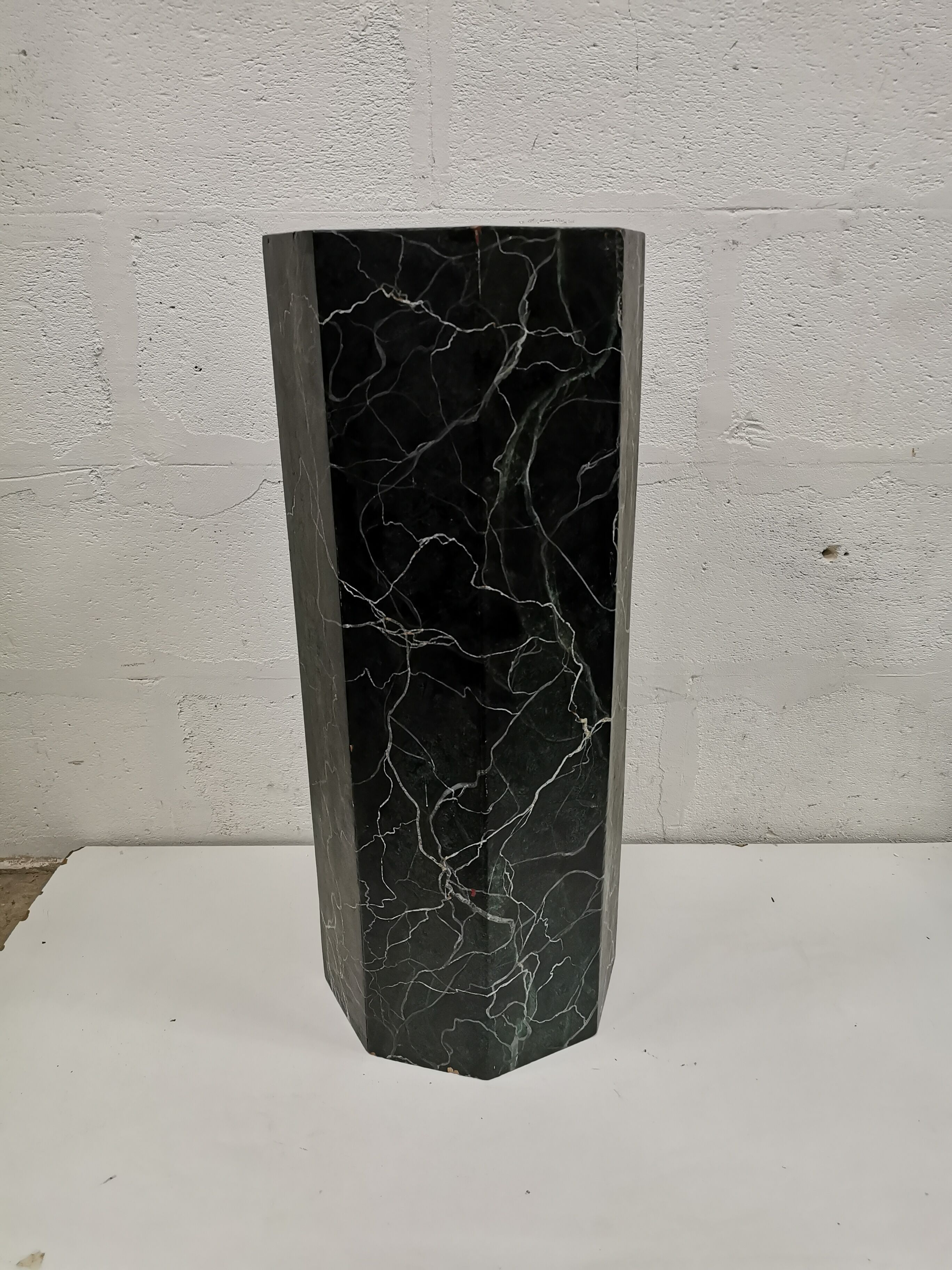 False marble pedestal
