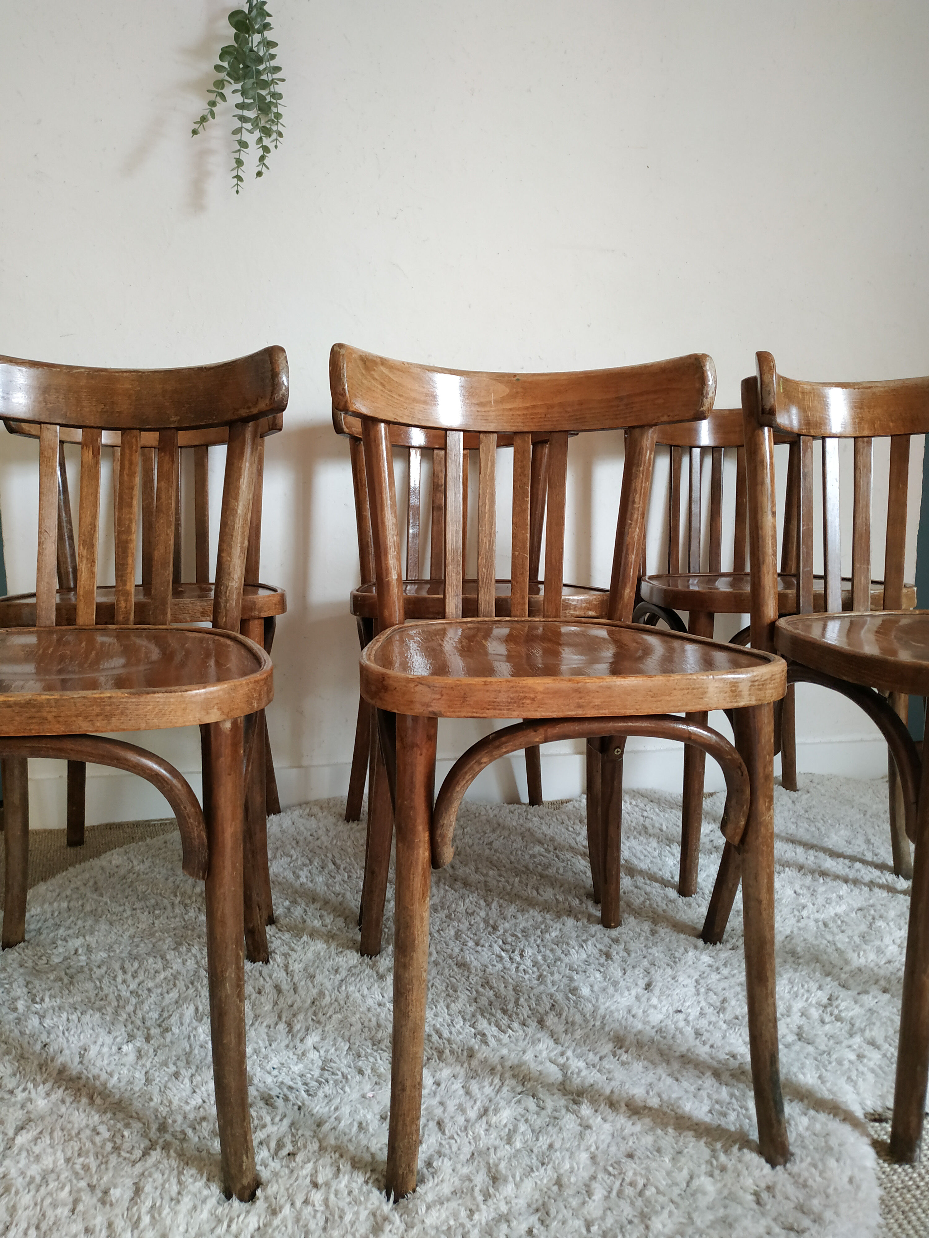 Lot of 7 patinated bistro chairs