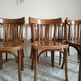 Lot of 7 patinated bistro chairs