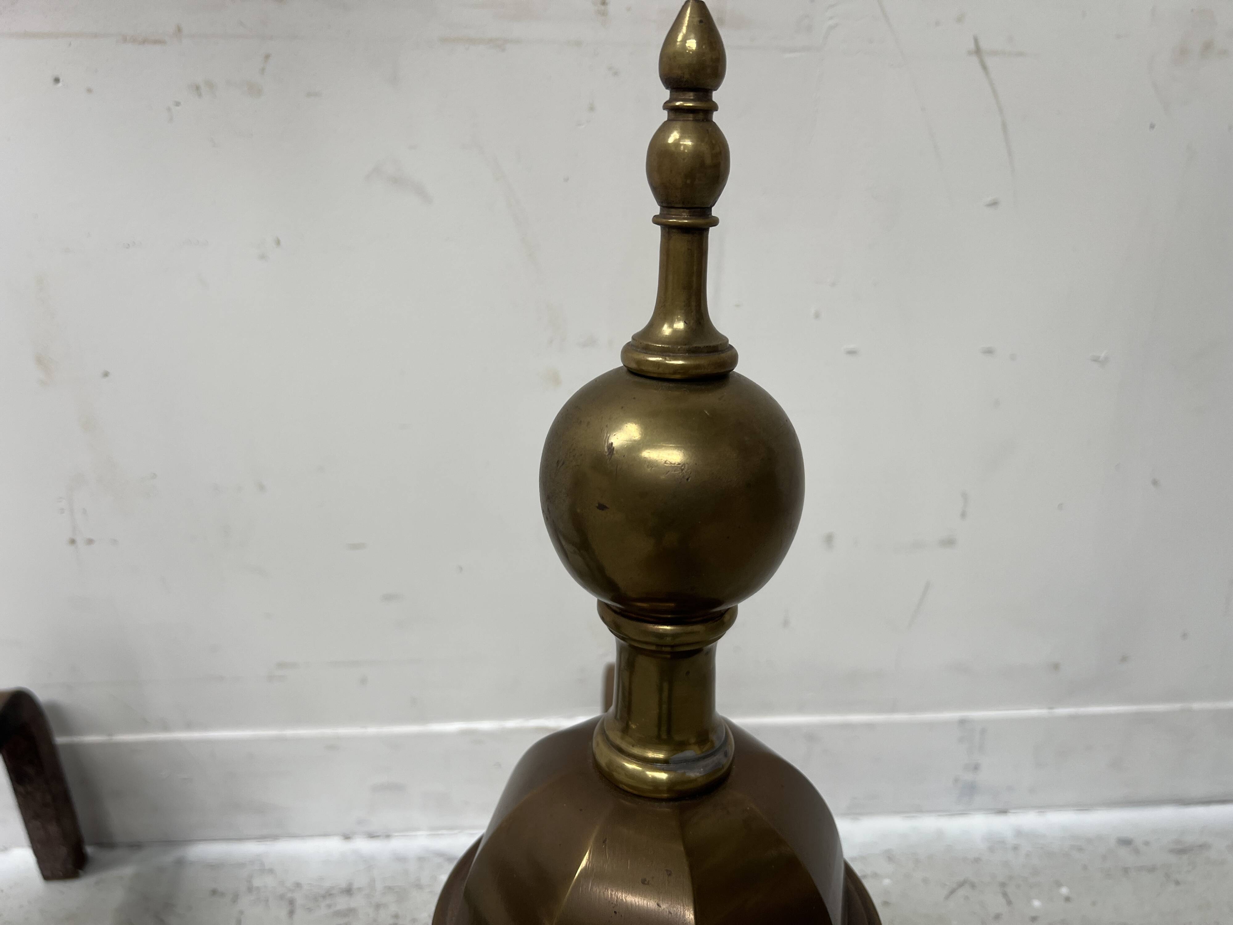 Important pair of brass log holders from the 20th century.