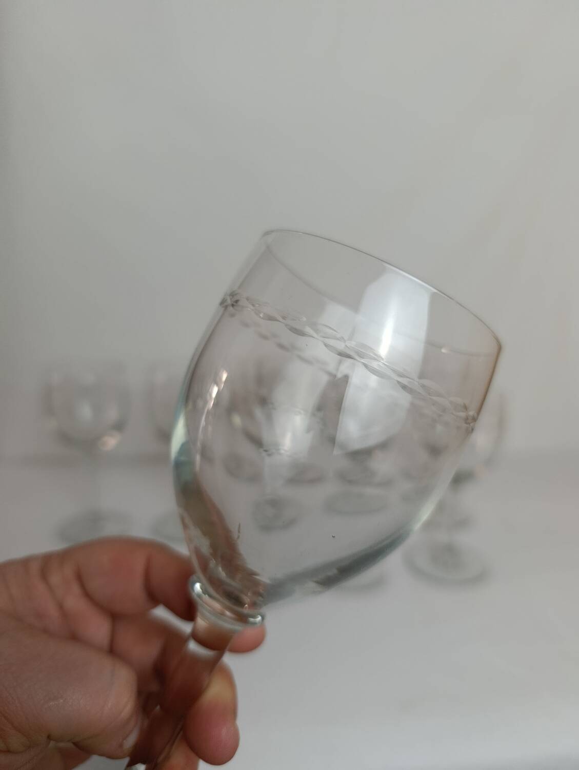 Set of 9 antique engraved crystal wine glasses