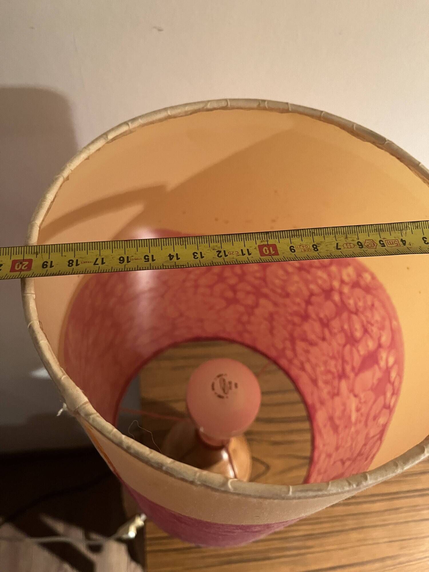 Vintage lamp with a carved wooden base from the 1970s.