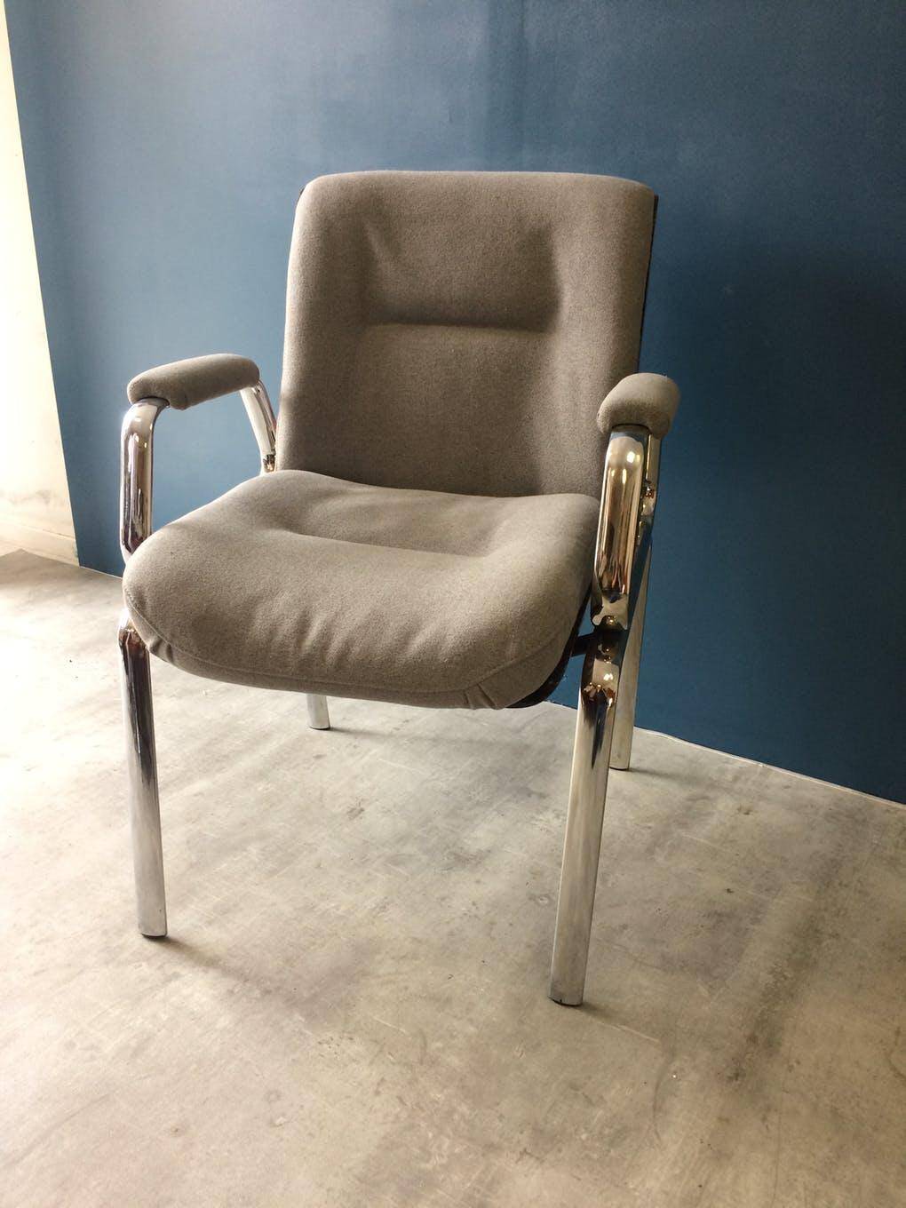 Wood and chrome armchair from the 70s.