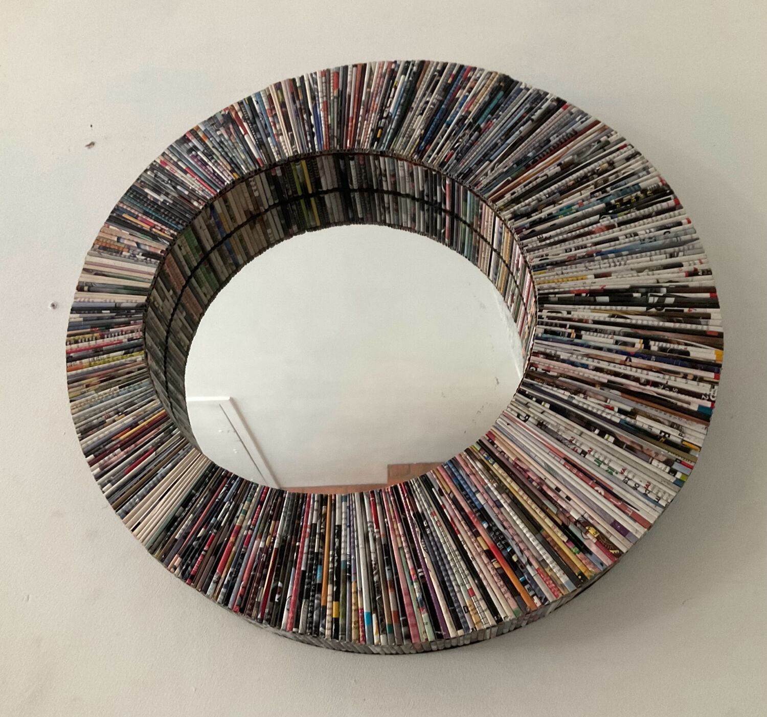 Vintage round mirror made of paper rolls