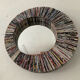 Vintage round mirror made of paper rolls